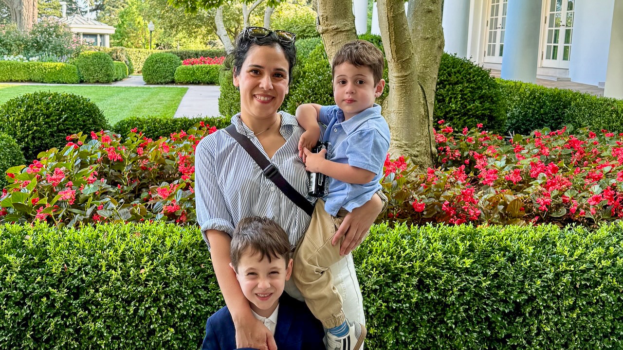 Itir and her family take a photo in the Rose Garden